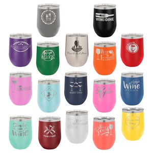May include: A collection of 16 stainless steel wine tumblers with various designs and colors. The tumblers feature different sayings and graphics related to wine, such as "Wine & Clock", "Wine Dine", "Wine Collection", and "Always Wine O'Clock".