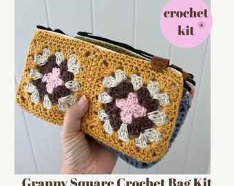 May include: A crochet kit for a granny square bag featuring a zippered pouch with a mustard yellow, brown, and cream floral pattern. The kit includes a pattern and step-by-step tutorial. A small brown leather tag labeled mavis & flo is attached.