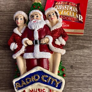 Radio City Music Hall Christmas Spectacular The Rockettes and Santa  Christmas Ornament