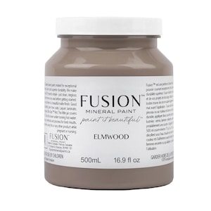May include: A 500ml bottle of Fusion Mineral Paint in the colour Elmwood. The paint is a light brown colour and is labelled "paint it beautiful".