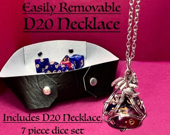 D20 NECKLACE**easily removed for use. Includes entire 7 piece Polyhedral Dice Set. Arrives packaged in vegan leather folding dice tray.