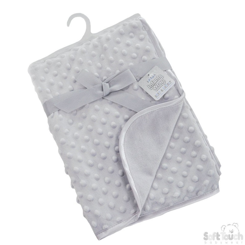 May include: A gray baby blanket with a soft, textured surface. The blanket has a satin ribbon tied around it and a tag that says "Little Infants Wrap, Soft & Snuggly".