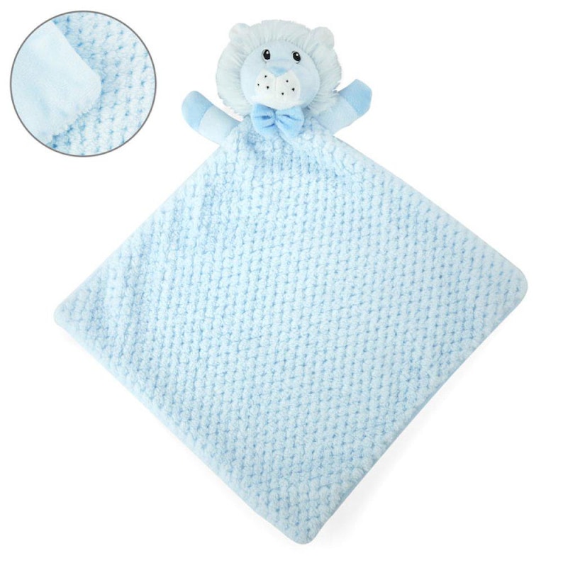May include: A light blue baby security blanket with a lion head plush toy attached. The lion has a blue bow tie and small arms. The blanket has a textured, quilted pattern. A close-up of the blanket's texture is in the upper left corner.