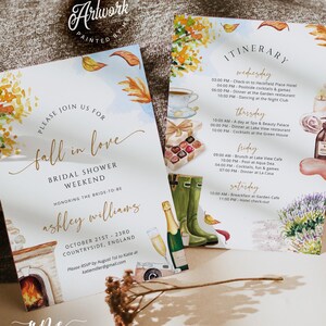 May include: Watercolor bridal shower weekend invitation with fall foliage and itinerary details. Features a fireplace, champagne, and wellington boots. Includes the text "Fall in Love" and the bride's name, Ashley Williams.