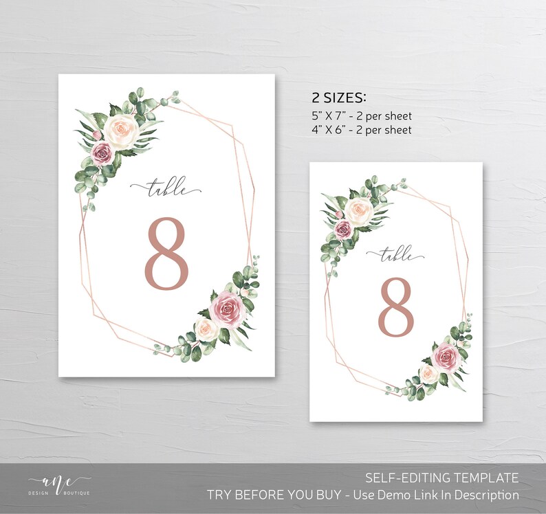 May include: Printable table number template with a floral design in shades of pink and white with greenery. The number 8 is displayed in a rose gold font within a geometric frame. The text "table" is written in cursive above the number. The template is available in two sizes: 5 inches by 7 inches and 4 inches by 6 inches.