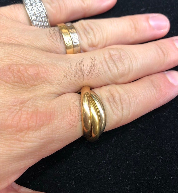 cartier tri color gold rolling ring