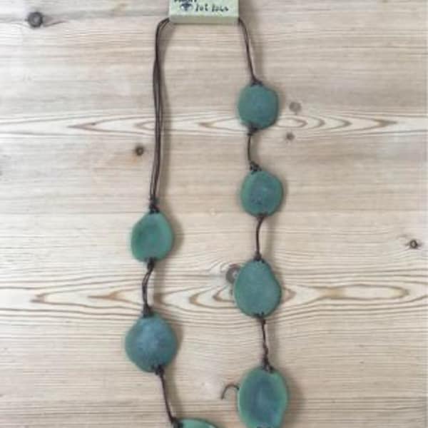 Vintage 2009 Fat Face Turquoise Tagua Nut Necklace, knotted brown cord, original packaging. "Life without love is like a tree without fruit"