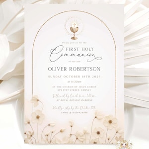 May include: A white invitation with gold accents for a First Holy Communion. The invitation features a floral design with a gold chalice and host. The text reads "Please join us for the First Holy Communion of Oliver Robertson, Sunday October 18th 2026 at 11:30am at the Church of Jesus Christ 275 Pitt Street, Sydney. Followed by lunch from 1:30pm at Royal Botanic Gardens. Kindly RSVP by the October 8th Emma @ 0433924468."