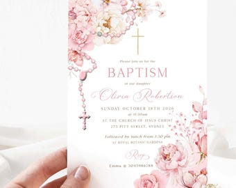 May include: A baptism invitation with a floral design in shades of pink and white. The invitation includes the text "BAPTISM" and details such as the date, time, and location. A rosary and cross are also featured.