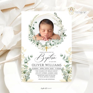 May include: A baptism invitation with a watercolor wreath of eucalyptus leaves and gold accents. The invitation features a photo of a baby boy sleeping and the text "Please join us for the Baptism of our son Oliver Williams Sunday April 20th, 2025 - 11:30am The Church of Jesus Christ 275 Pitt Street, Sydney NSW Reception lunch to follow at Royal Botanic Gardens RSVP Emma 3450659488"
