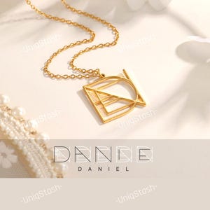 Gold-plated custom name logo necklace displayed on a white surface, showing a geometric abstract monogram pendant on a delicate chain. Name Logo Necklace, Custom Personalised Minimalist Monogram Nameplate Pendant Gift For Her Birthday, Anniversary, Mothers Day