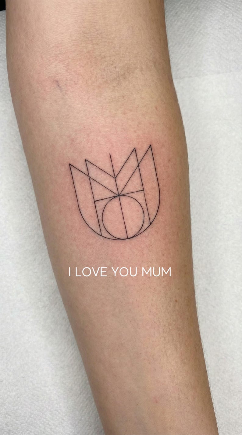 i love you mum monogram logo tattoo on the arm.