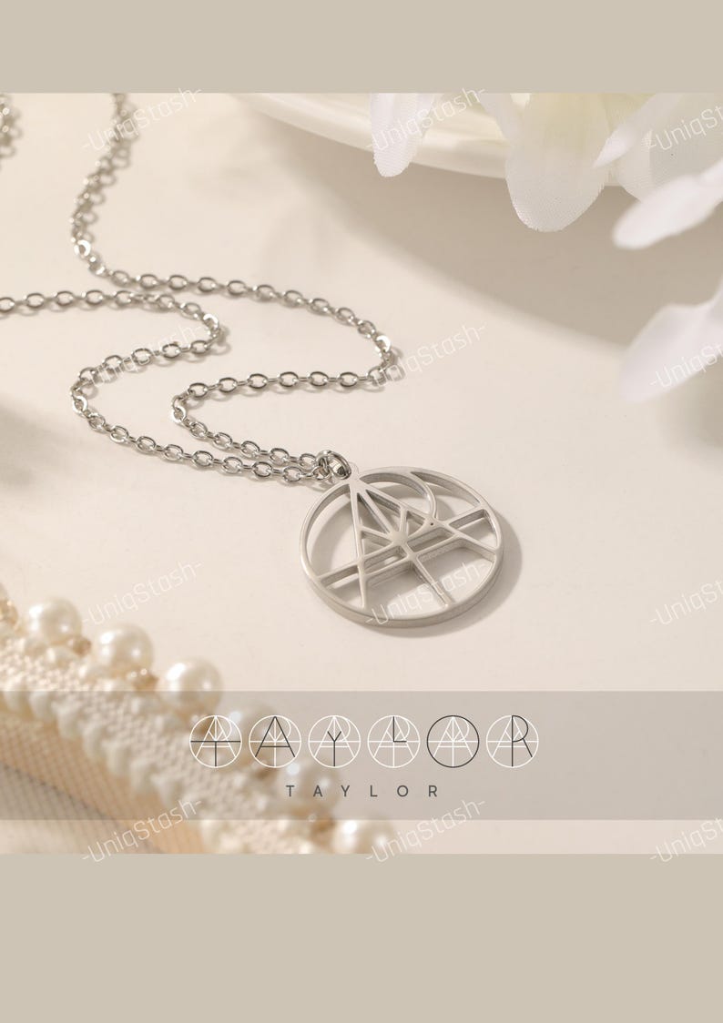 Custom name logo necklace: round minimalist monogram nameplate pendant in stainless steel on a delicate silver chain.