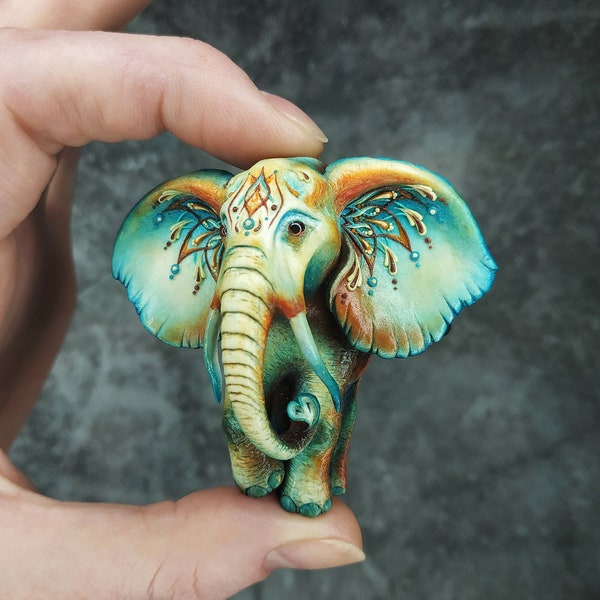 Brooch turquoise elephant with ornament. Extravagant large brooch. A bright jrwelry for a gift to a girlfriend.