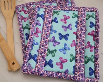 Butterfly pot holders, purple geometric print, deluxe XL pot holders, 2 insulbrite, 2 batting, 2 cotton, 1 flex, quilted hot pads, trivets