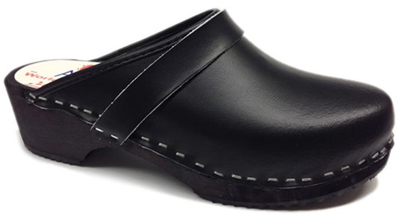 black wooden clogs