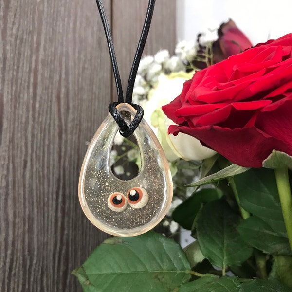 Pendentif goutte résine et pâte fimo : yeux bruns