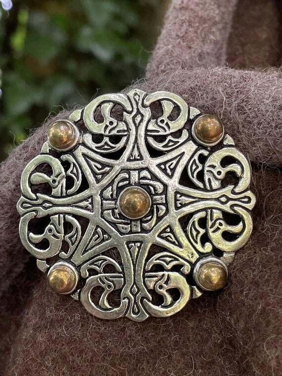 Disc brooch hotsell
