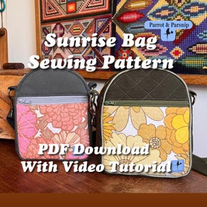 May include: Two small crossbody bags with zippered front pockets. The left bag features a pink and orange floral print with a gray top section. The right bag has a yellow and orange floral print with a quilted olive green top section.