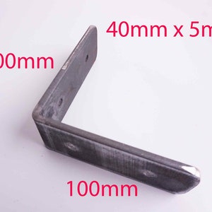 May include: A metal L-shaped bracket with dimensions of 40mm x 5mm and 100mm x 100mm. The bracket is made of steel and has a silver finish.
