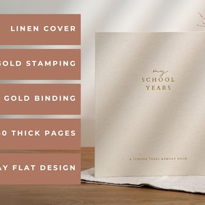 May include: A linen-covered memory book with gold stamping and binding. The cover reads "my SCHOOL YEARS" in gold lettering. The book has 80 thick pages and a lay-flat design. A School Years Memory Book.