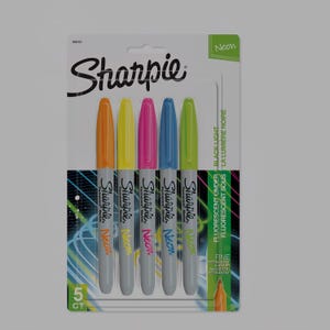 May include: A pack of five Sharpie Neon fine point permanent markers. The markers are orange, yellow, pink, blue, and green. The packaging features the Sharpie logo and the words "Neon" and "Fluorescent Under Black Light".
