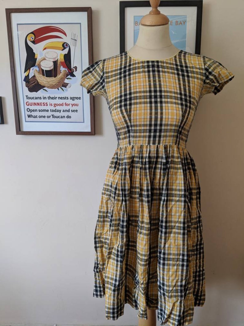 yellow and black checked dress
