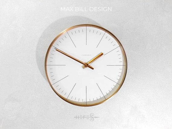 Reloj de pared Max Bill Junghans 1958 Diseno original de la Bauhaus Articulo de coleccionista de laton Etsy Espana