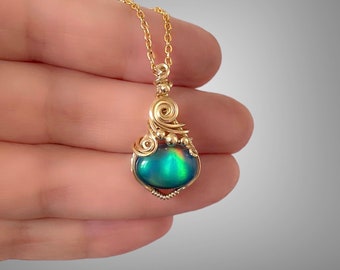 Aurora opal pendant wrapped in 14K gold filled. Handmade golden jewelry. Wire wrapped gemstone. Unique gift for her.