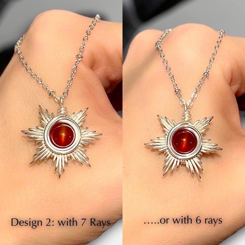 May include: Two silver necklaces with a red gemstone sun pendant. The pendant on the left has seven rays and the pendant on the right has six rays.  Design 2: with 7 Rays.....or with 6 rays