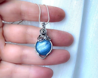 Kyanite pendant wrapped in 925 Sterling silver. Wire wrapped gemstone. Handmade silver jewelry. Boho jewelry.