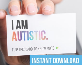 May include: A white card with the text "I AM AUTISTIC." in rainbow colors. The card also has the text "FLIP THIS CARD TO KNOW MORE" with a play button icon.