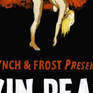 May include: A vintage poster advertising a show called "Vin Pea" with the text "Lynch & Frost Present" in orange lettering. The poster features a woman in a red feather boa hanging upside down.