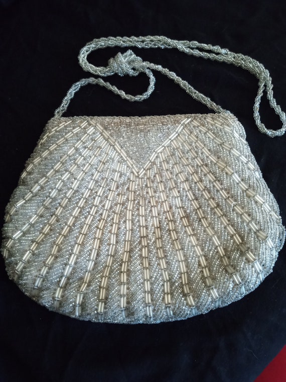 Silvery Beaded purse with satin lining and, beaded