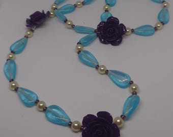 Purple flowers with Glass teardrop