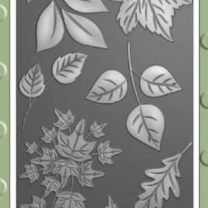 May include: A 3D embossing folder from The Slimline Collection by Lisa Horton. The design features various foliage elements, including leaves and branches. The package includes a coordinating outline cutting die. The text "FOLIAGE ELEMENTS" is visible.