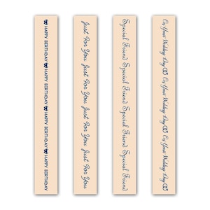 May include: Four rectangular gift tags with text in navy blue. The tags have a light peach background. The text on the tags reads: "HAPPY BIRTHDAY", "Just For You", "Special Friend", and "On Your Wedding Day".