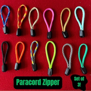 May include: Set of 10 colorful paracord zipper pulls. The zipper pulls are made of durable paracord and have a black metal loop at the end. The colors include blue, red, orange, yellow, green, pink, black, brown, and white.