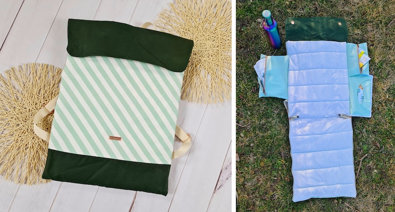 May include: A green and white striped travel pillow with a dark green outer layer and a zipper. The pillow is folded and laid flat on a white wooden surface. The pillow is also shown unfolded and laid flat on a green grassy surface.