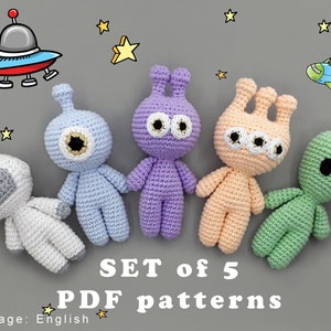 May include: Set of 5 crochet amigurumi PDF patterns for making space-themed toys. The patterns include a purple alien with three eyes, a blue alien with one eye, an orange alien with three eyes, a green alien, and a white astronaut.