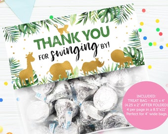 May include: Thank you for swinging by! Green and gold jungle animal themed favor bag with a white background. The bag is 4.25 inches by 4 inches and folds to 4.25 inches by 2 inches.  The bag is perfect for 4 inch wide bags.