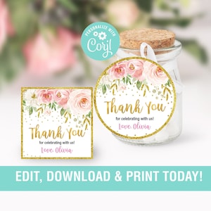 May include: Two thank you favor tags with a floral design and gold glitter. The text on the tags reads "Thank You for celebrating with us! Love. Olivia".