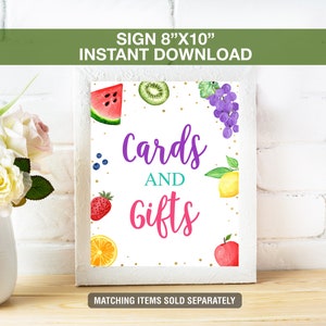 May include: White framed sign, 8"x10", with watercolor fruit illustrations and the words "Cards and Gifts". The sign includes a watermelon slice, kiwi, grapes, blueberries, strawberry, orange slice, lemon, and apple. The text "Instant Download" is at the top.
