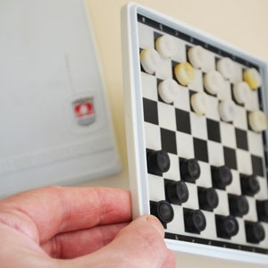 Vintage checkers set, Mini magnetic travel checkers