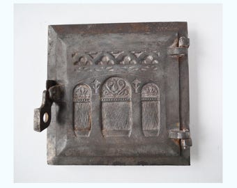 Puerta de horno de leña antiguo, puerta de estufa de hierro fundido