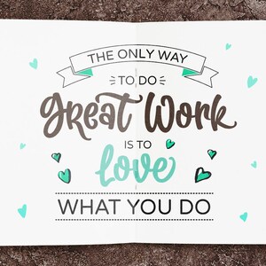 May include: A white notebook with a motivational quote that reads "The only way to do great work is to love what you do". The quote is written in black and brown lettering with a green ribbon and hearts.