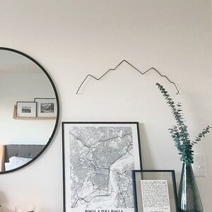 Wire mountain wall art.