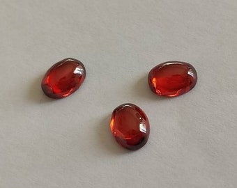 Cabochon granato rosso sintetico ovale 6x8mm 5pz.