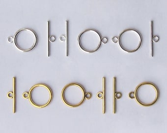 Chiusura a T in ottone placcato 5pz. oro, argento, bronzo anticato