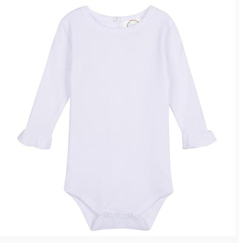 May include: White long-sleeve baby bodysuit with ruffled sleeves.
